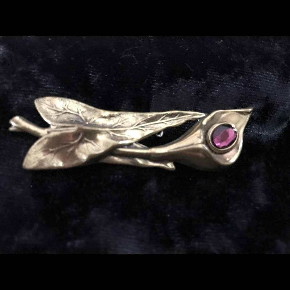 Lilly pin with purple stone